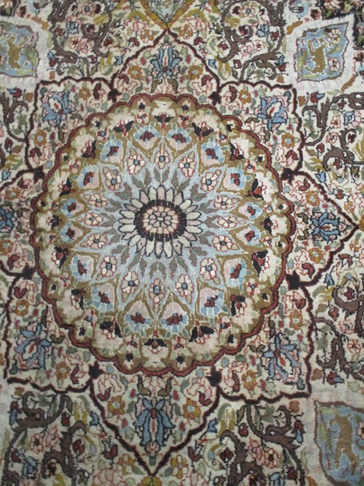 A black ground carpet with floral design, animals etc. approx 12ft x 8ft 10 inches - Image 4 of 8