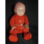 A vintage celluloid jointed doll