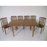 A mid-century Meredew extending dining table, along with six matching chairs