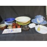 A collection of ceramic chargers, plates, pottery bowls etc