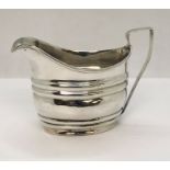 A Georgian hallmarked silver cream jug, weight 106.2g