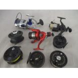 A collection of various fishing reels including Fladen, Shakespeare, Mirage etc.