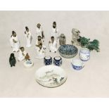 A collection of Chinese and Eastern themed ceramics, carved figures, etc.