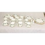 A part Duchess Ivy dinner service including cups, saucers, bowls, sandwich plates, salt and pepper