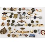 A collection of badges, buttons etc. including silver, military, submarine service etc.