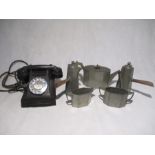 A vintage black bakelite telephone, along with five pieces of pewter.