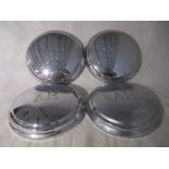 A set of four Austin Healey hub caps