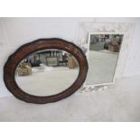A Victorian oval mirror along with one other