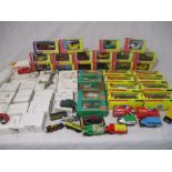 A collection of various die-cast vehicles including Matchbox, Corgi, Shell Classic Sportscars,