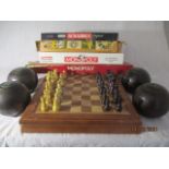 A set of Slazenger bowls, chess set, games etc.