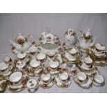A large collection of Royal Albert Old Country Roses china including coffee pot, tea pot, trios,