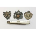 Three hallmarked silver medallions along with a silver bladed fruit knife