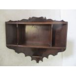 An oak hanging corner cupboard with "secret" cupboard to top