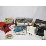 An collection of toys including a boxed Lledo Vanguard Ford die cast collection featuring a Ford