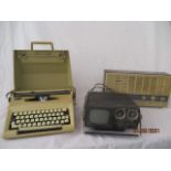 An Erres vintage radio, Smith Corona typewriter and a portable Crown Tv/radio combi