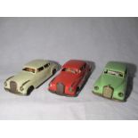 Three tin plate Mercedes traction driven model cars. Made in West Germany by NF. AF