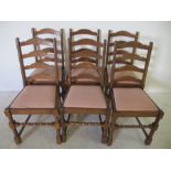 A set of six Jaycee ladderback dining chairs