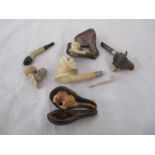 A collection of Meerschaum and other vintage pipes