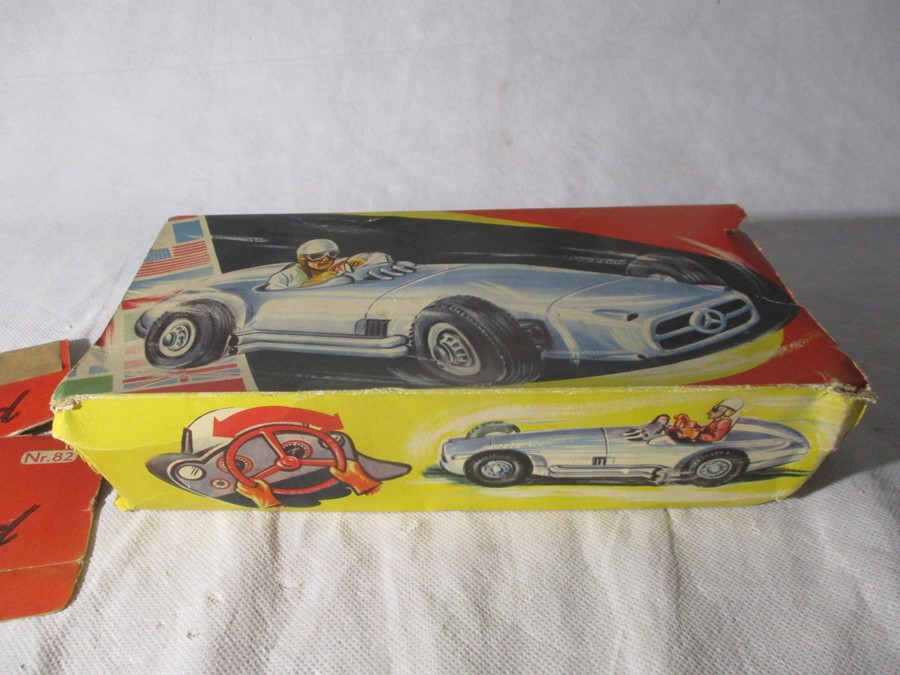 A vintage Mercedes Benz friction driven, tin plate model racer, Made in West Germany by NF. Car No - Bild 10 aus 14