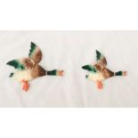 Two plaster flying ducks; larger one 28cm width, smaller one A/F