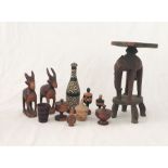 An assortment of wooden items including African influenced items, elephant stool etc.