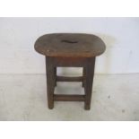 A vintage wooden stool