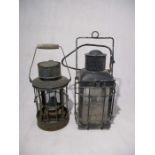 A metal lantern by Hinks (Birmingham) dated 1918, along with a metal hanging lantern, converted to