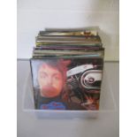 A collection of 12" vinyl records including Blondie, ELO, Squeeze, Moody Blues, Simon & Garfunkel,