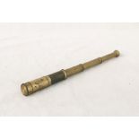 A small brass four draw telescope