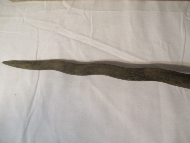 A 20th century Kris (possibly Balinese) with undulating double edged blade. The SCM grip formed as a - Image 23 of 27