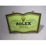 A Rolex Watches light up shop advertising sign