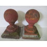 A pair of terracotta gate finials