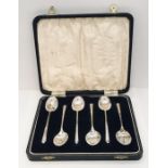 A cased hallmarked silver set of coffee spoons