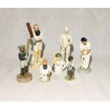 A collection of cricket themed figurines one signed Mary Mitchell-Smith