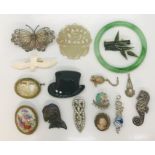 A collection of costume jewellery including a continental silver butterfly brooch, apple jade