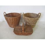 Two wicker log baskets, along with a wicker picnic basket