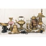 A quantity of brass items including, GWR reproduction lamps, lamps, horse brasses, Titanic bell,