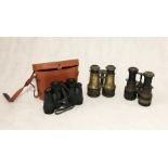 Three pairs of vintage binoculars including one with broad arrow stamp marked S.4 933.