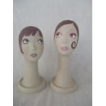 Two Art Deco style shop display heads