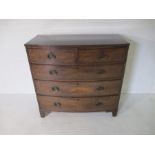 A Georgian mahogany bow fronted chest of five drawers