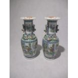 A pair of Chinese vases with two handles modelled as temple dogs - one vase A/F, height approx.