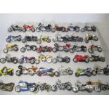 A collection of thirty six model motorcycles including Maisto etc