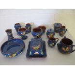 A selection of Torquay Ware pottery