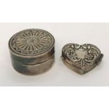 A small hallmarked silver heart shaped pill box along with one other ( marked 925)