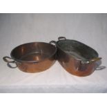 A large copper jam pan, along with one other