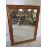 A large pine framed mirror, 120cm x 88cm