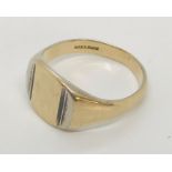 A men's silver ring embellished with rolled gold