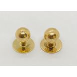Two 18ct gold studs, weight 3.6g