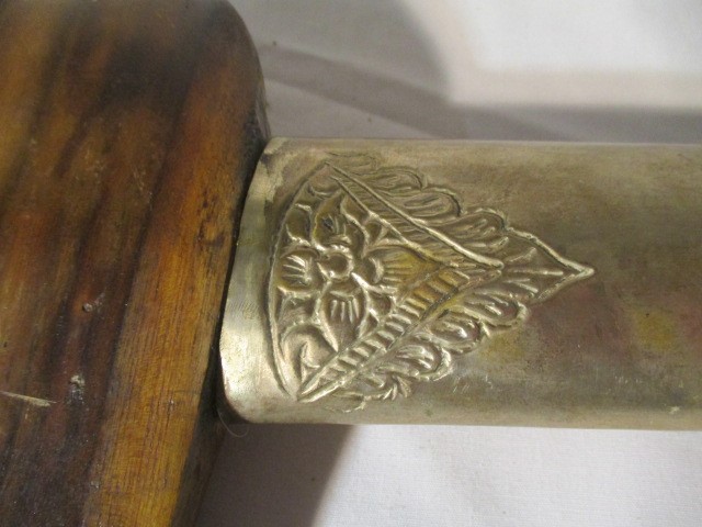 A 20th century Kris (possibly Balinese) with undulating double edged blade. The SCM grip formed as a - Image 19 of 27