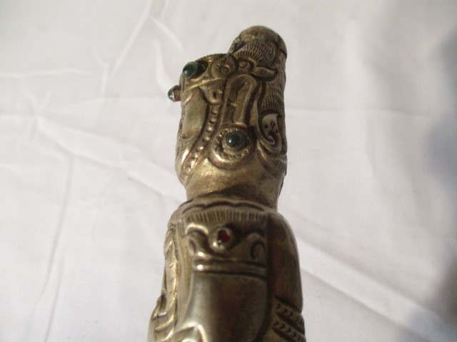 A 20th century Kris (possibly Balinese) with undulating double edged blade. The SCM grip formed as a - Image 18 of 27